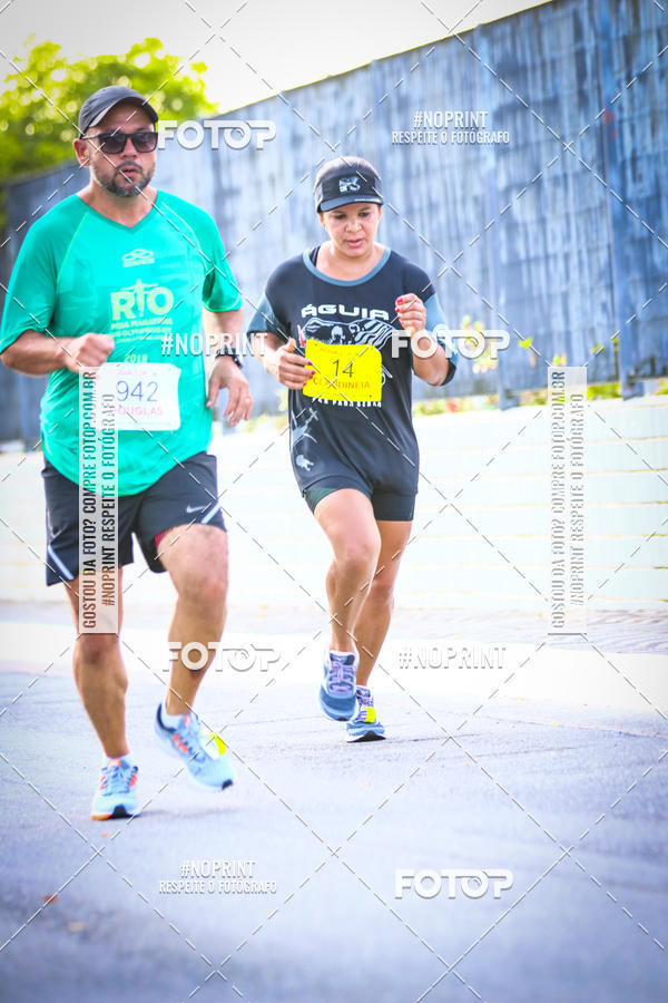 Buy your photos of the eventguia 13K Praia Grande on Fotop