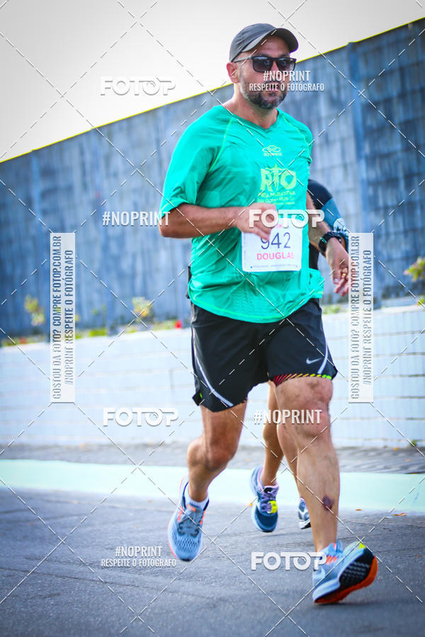 Buy your photos of the eventguia 13K Praia Grande on Fotop