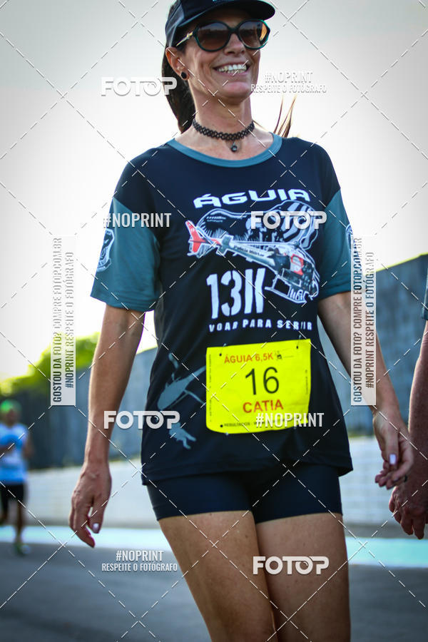 Buy your photos of the eventguia 13K Praia Grande on Fotop