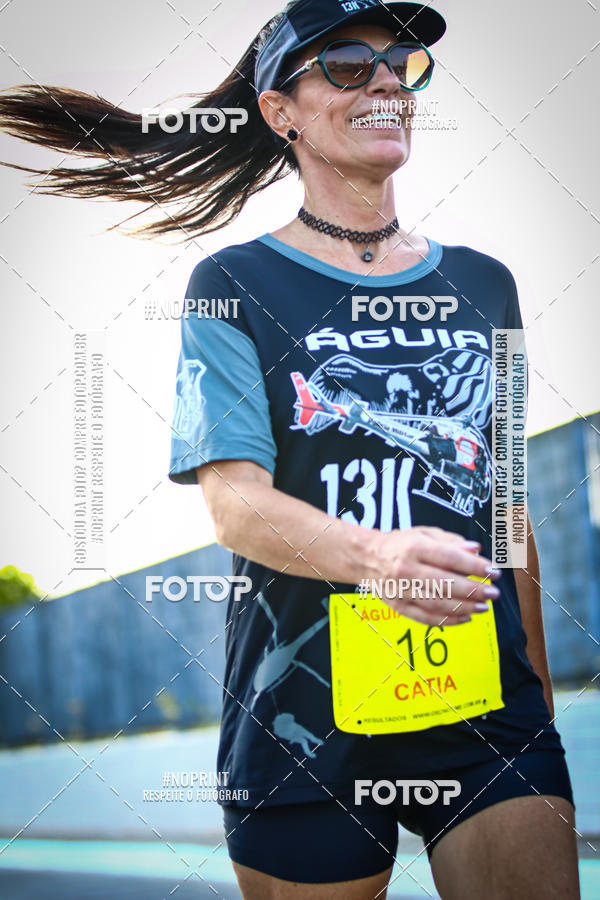 Buy your photos of the eventguia 13K Praia Grande on Fotop