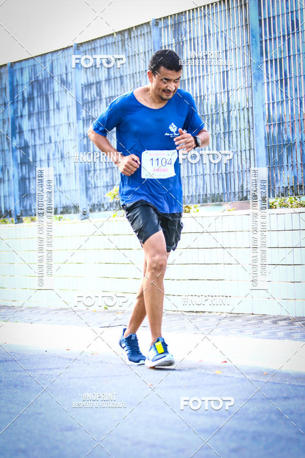 Buy your photos of the eventguia 13K Praia Grande on Fotop