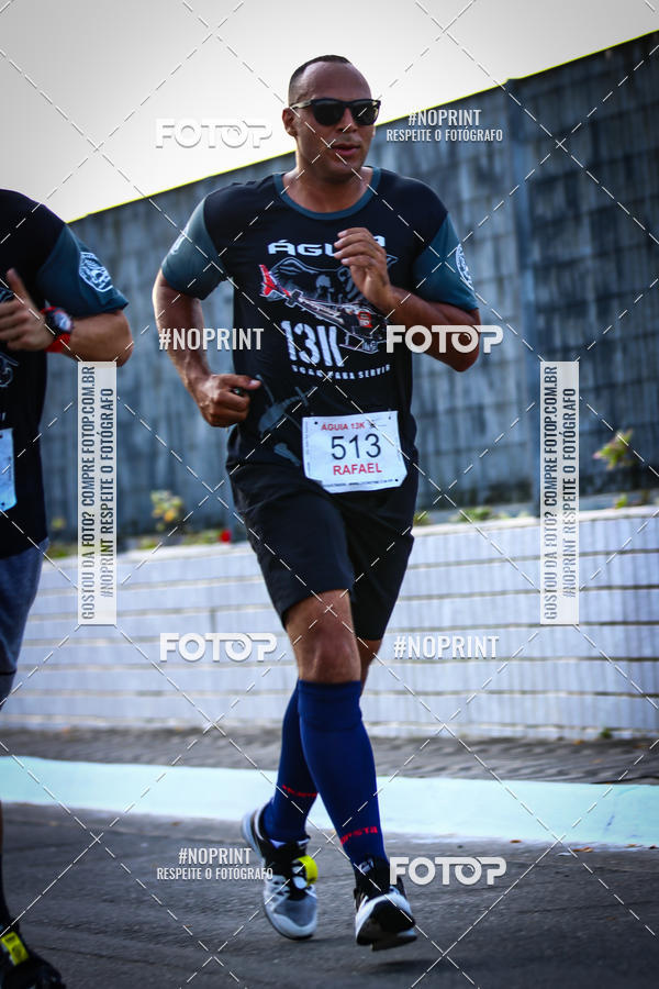 Buy your photos of the eventguia 13K Praia Grande on Fotop