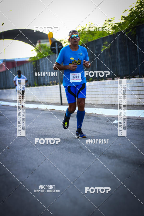 Buy your photos of the eventguia 13K Praia Grande on Fotop