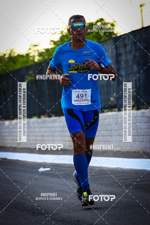 Buy your photos of the eventguia 13K Praia Grande on Fotop