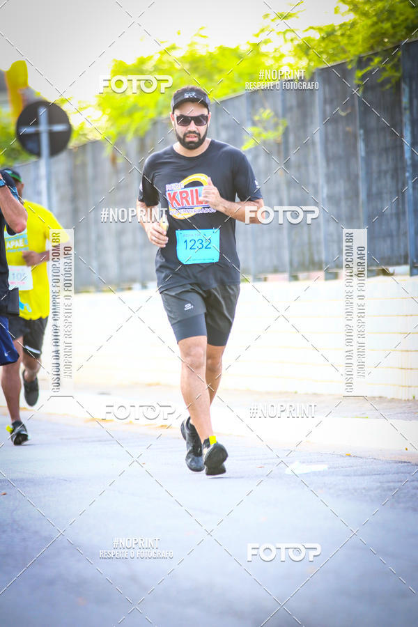 Buy your photos of the eventguia 13K Praia Grande on Fotop