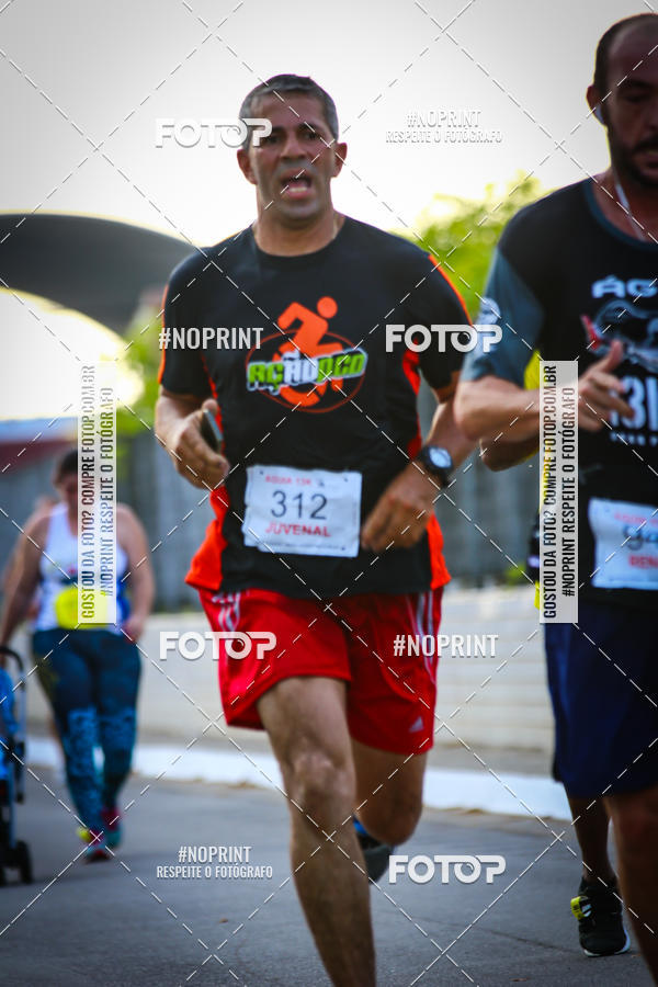 Buy your photos of the eventguia 13K Praia Grande on Fotop