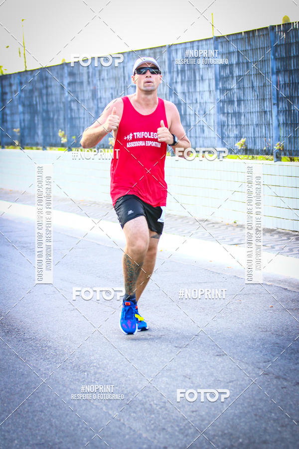 Buy your photos of the eventguia 13K Praia Grande on Fotop