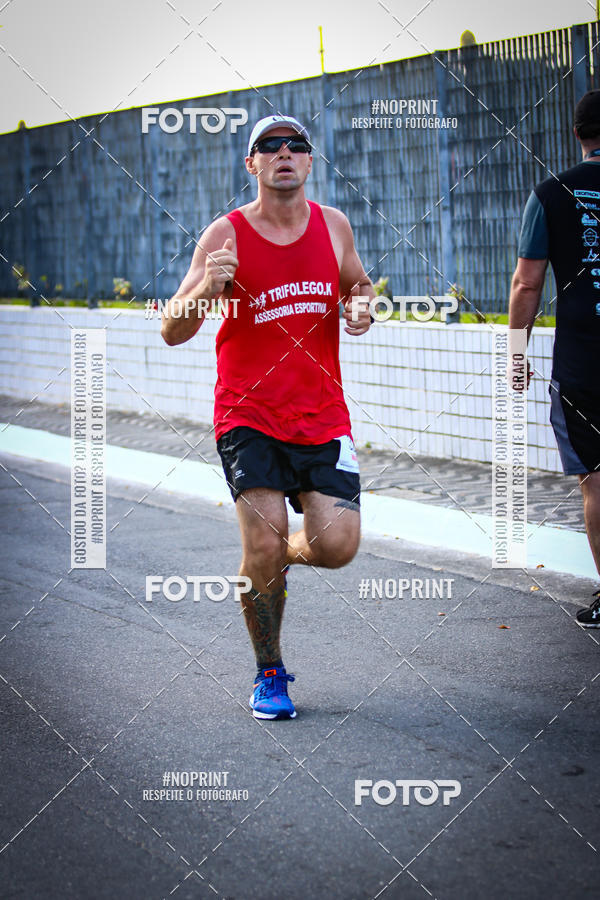 Buy your photos of the eventguia 13K Praia Grande on Fotop