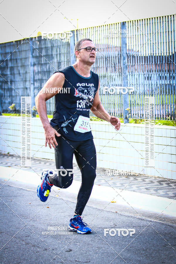 Buy your photos of the eventguia 13K Praia Grande on Fotop