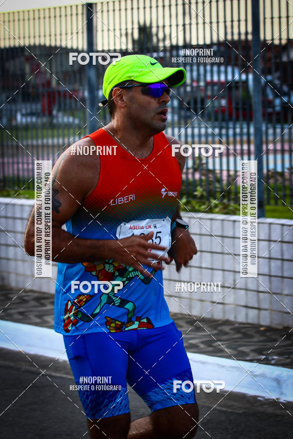 Buy your photos of the eventguia 13K Praia Grande on Fotop