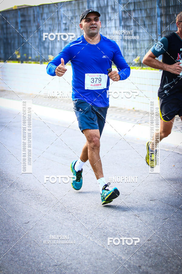 Buy your photos of the eventguia 13K Praia Grande on Fotop