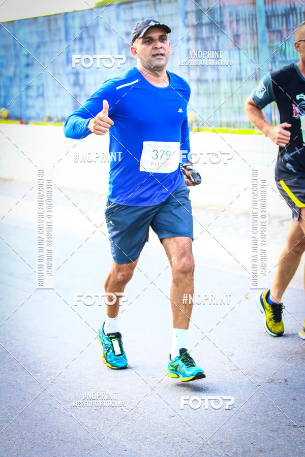 Buy your photos of the eventguia 13K Praia Grande on Fotop