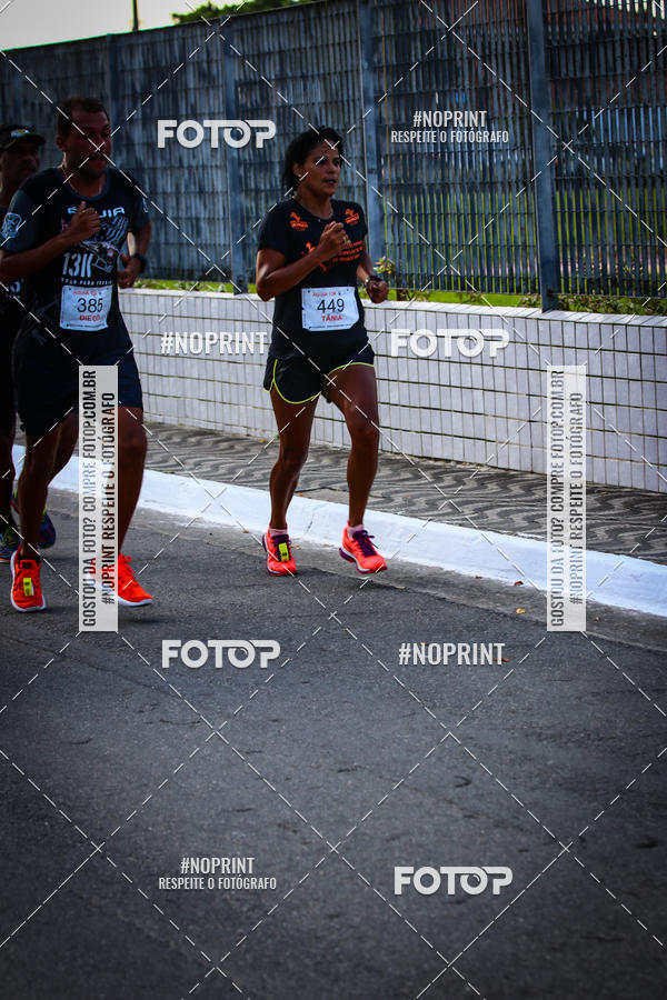 Buy your photos of the eventguia 13K Praia Grande on Fotop