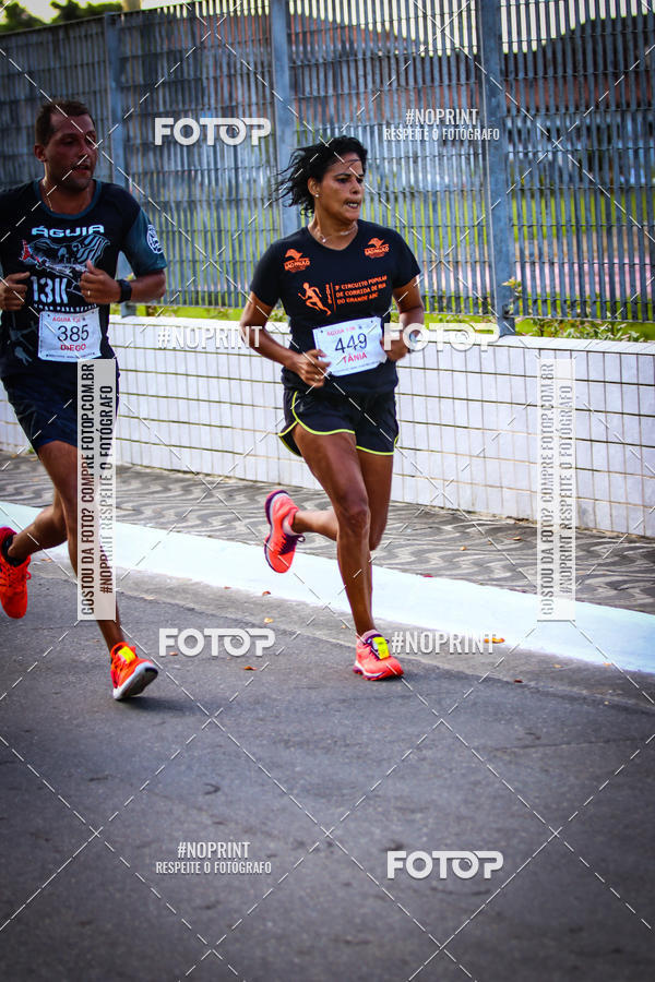 Buy your photos of the eventguia 13K Praia Grande on Fotop