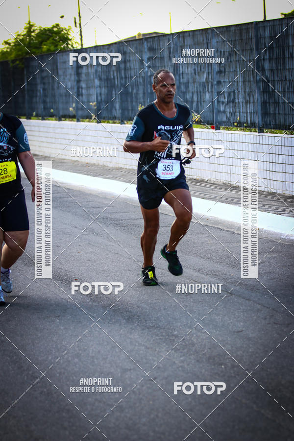 Buy your photos of the eventguia 13K Praia Grande on Fotop