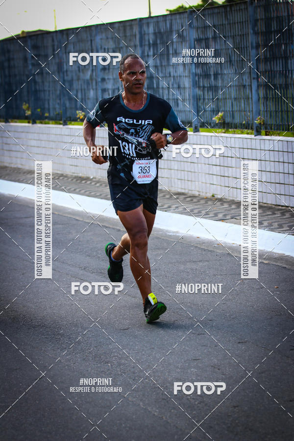 Buy your photos of the eventguia 13K Praia Grande on Fotop