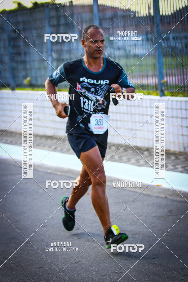 Buy your photos of the eventguia 13K Praia Grande on Fotop