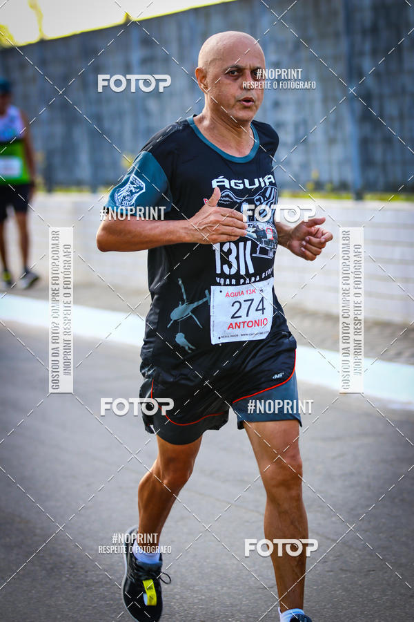 Buy your photos of the eventguia 13K Praia Grande on Fotop