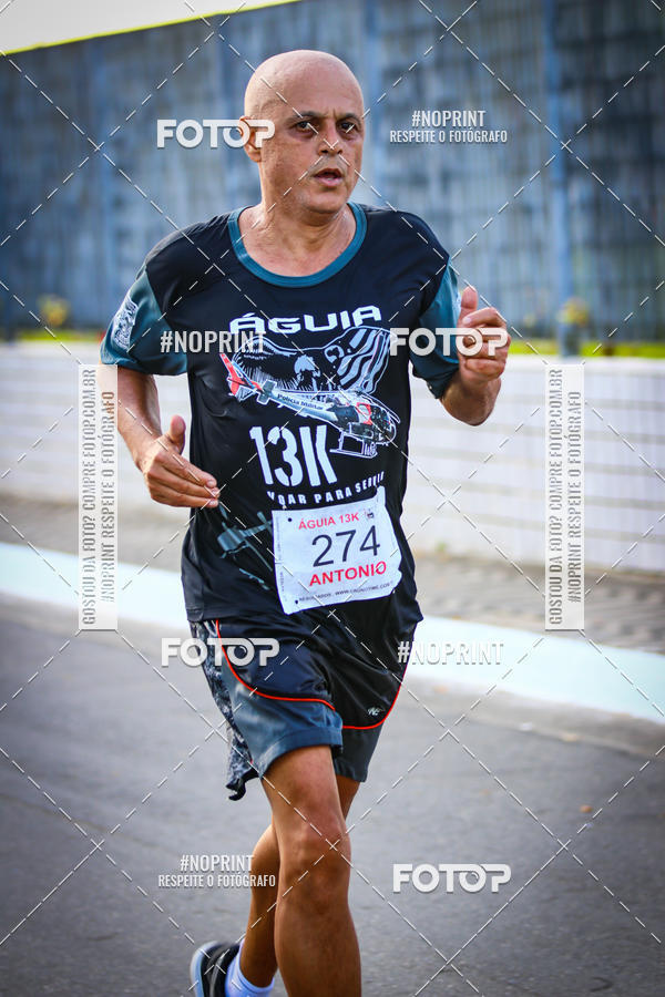 Buy your photos of the eventguia 13K Praia Grande on Fotop