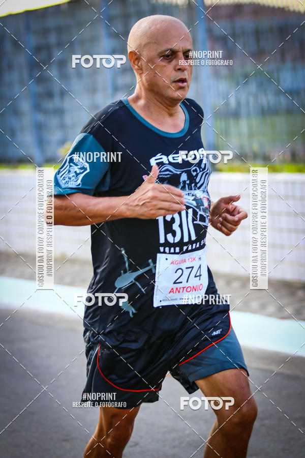 Buy your photos of the eventguia 13K Praia Grande on Fotop