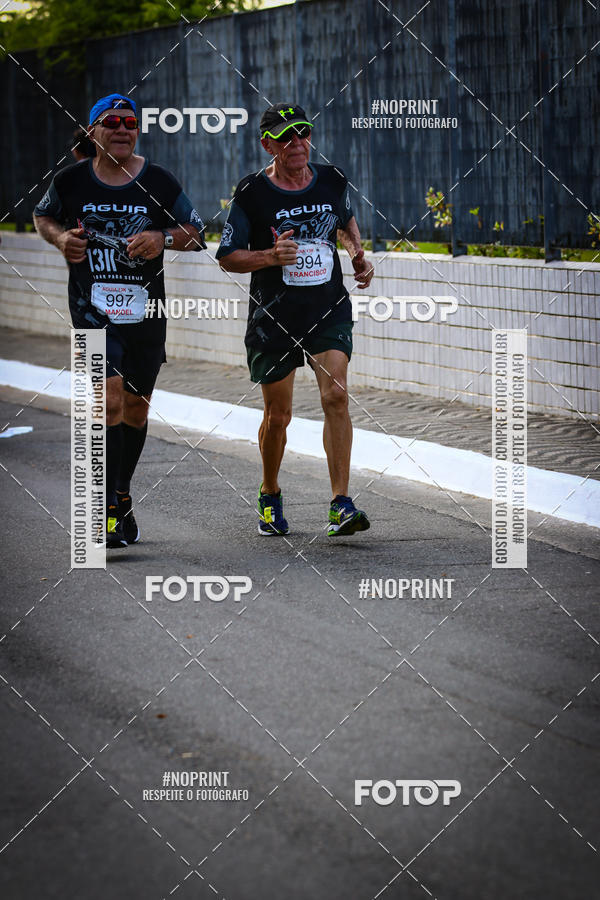 Buy your photos of the eventguia 13K Praia Grande on Fotop