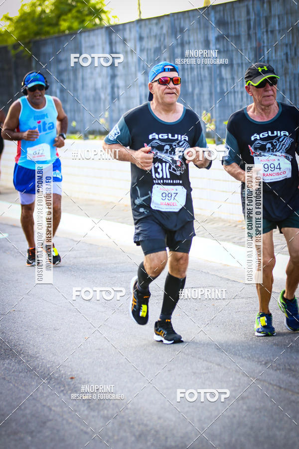 Buy your photos of the eventguia 13K Praia Grande on Fotop