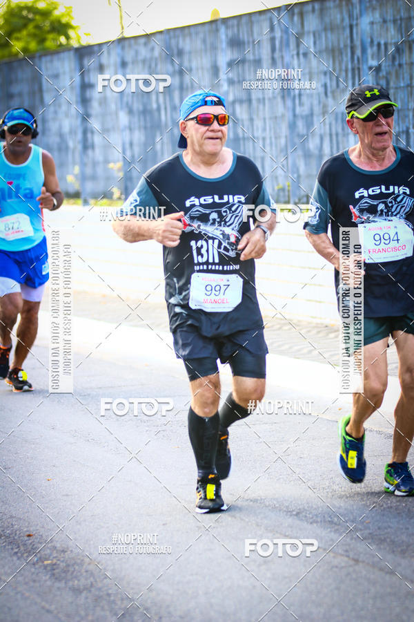 Buy your photos of the eventguia 13K Praia Grande on Fotop