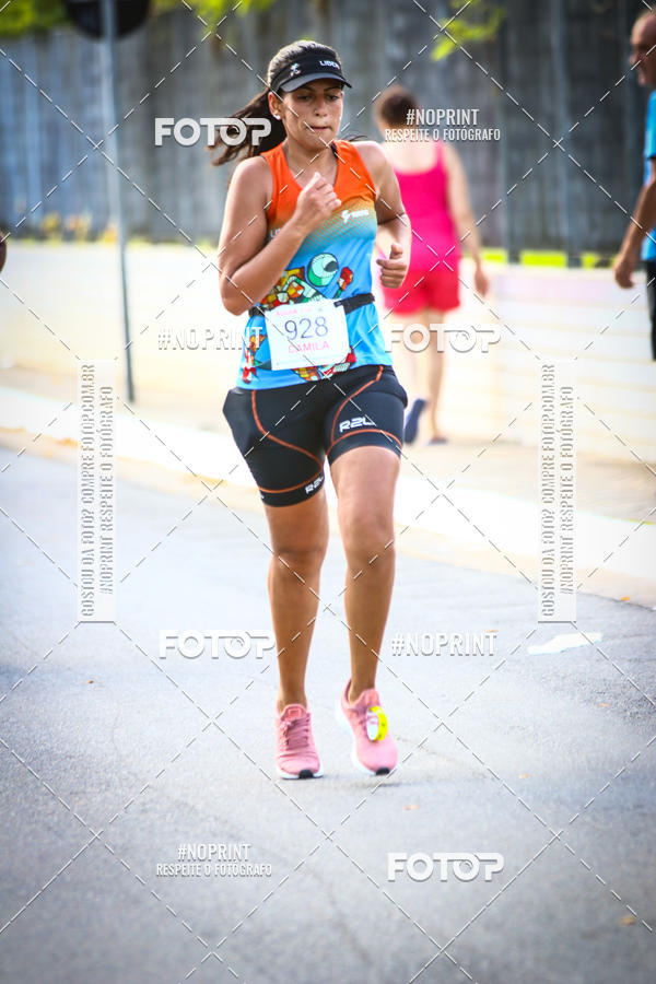 Buy your photos of the eventguia 13K Praia Grande on Fotop