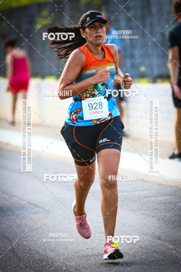 Buy your photos of the eventguia 13K Praia Grande on Fotop