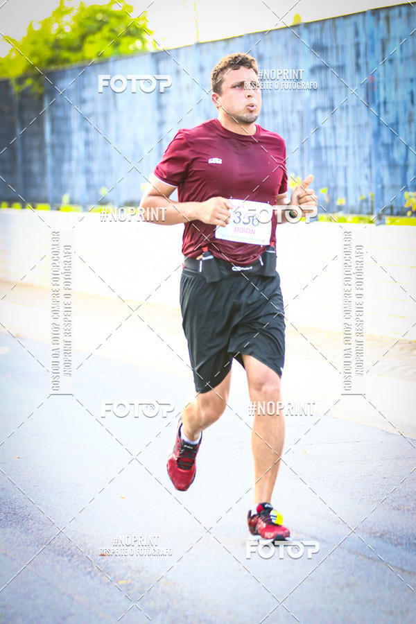 Buy your photos of the eventguia 13K Praia Grande on Fotop