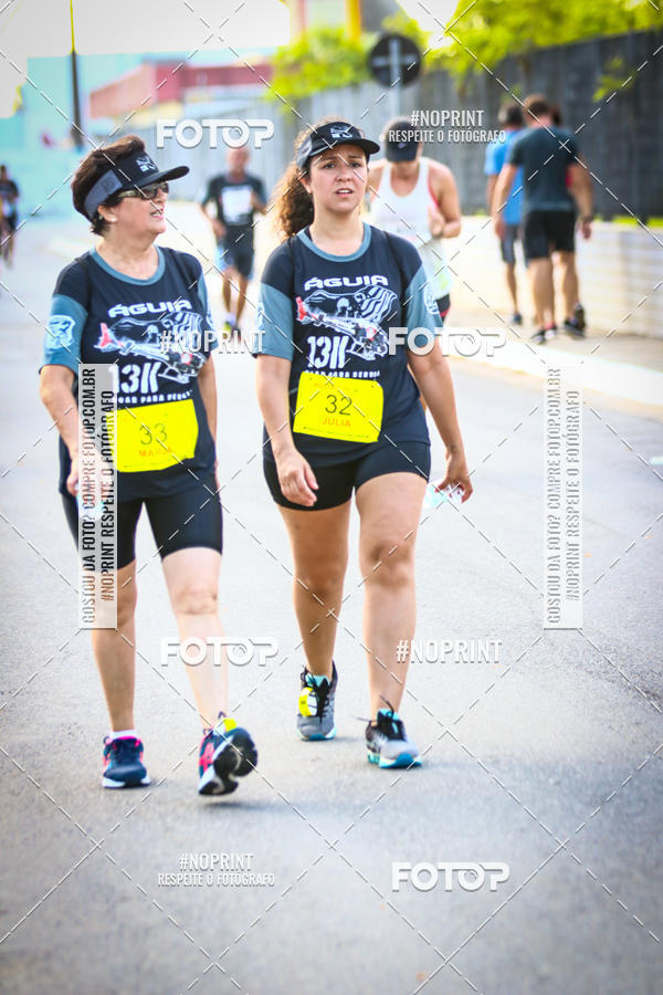 Buy your photos of the eventguia 13K Praia Grande on Fotop