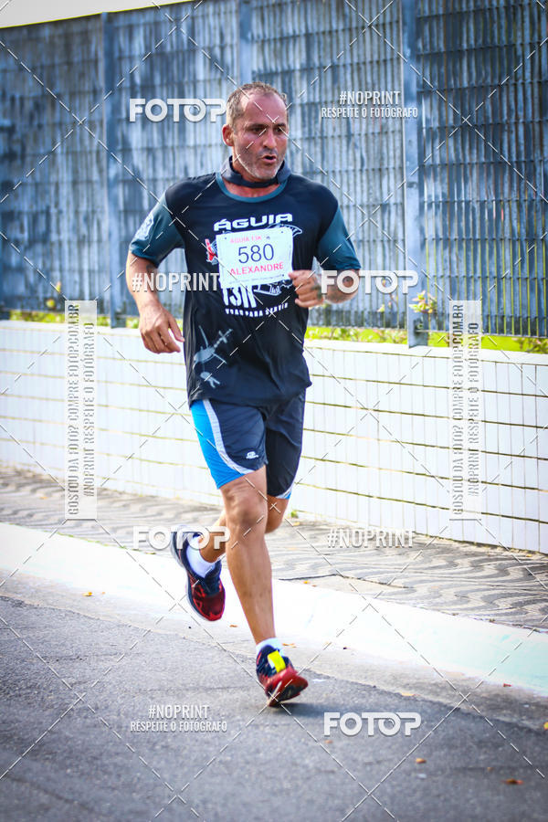 Buy your photos of the eventguia 13K Praia Grande on Fotop