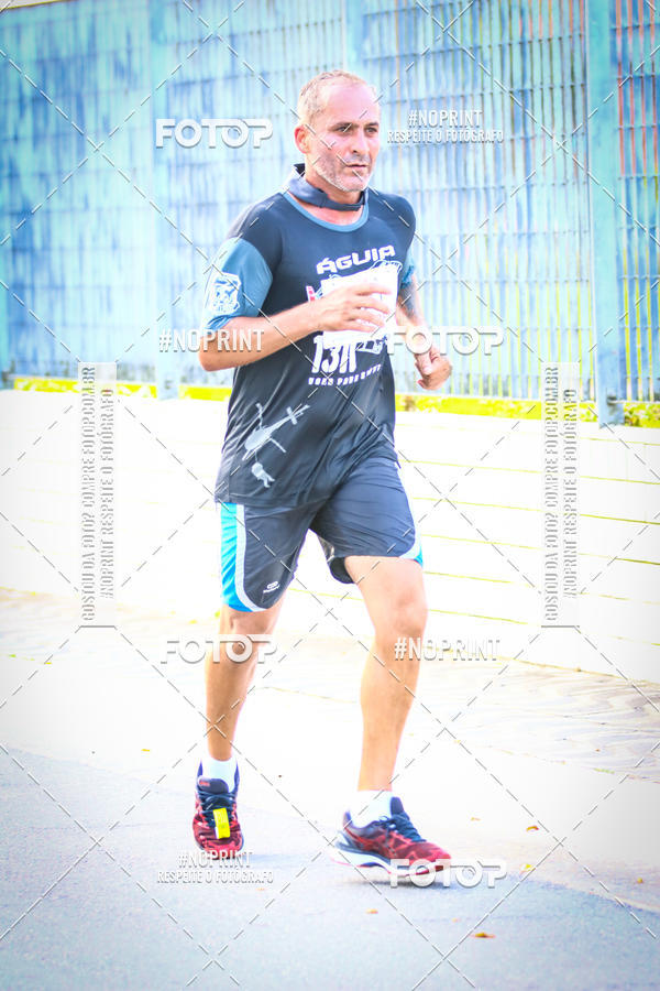 Buy your photos of the eventguia 13K Praia Grande on Fotop