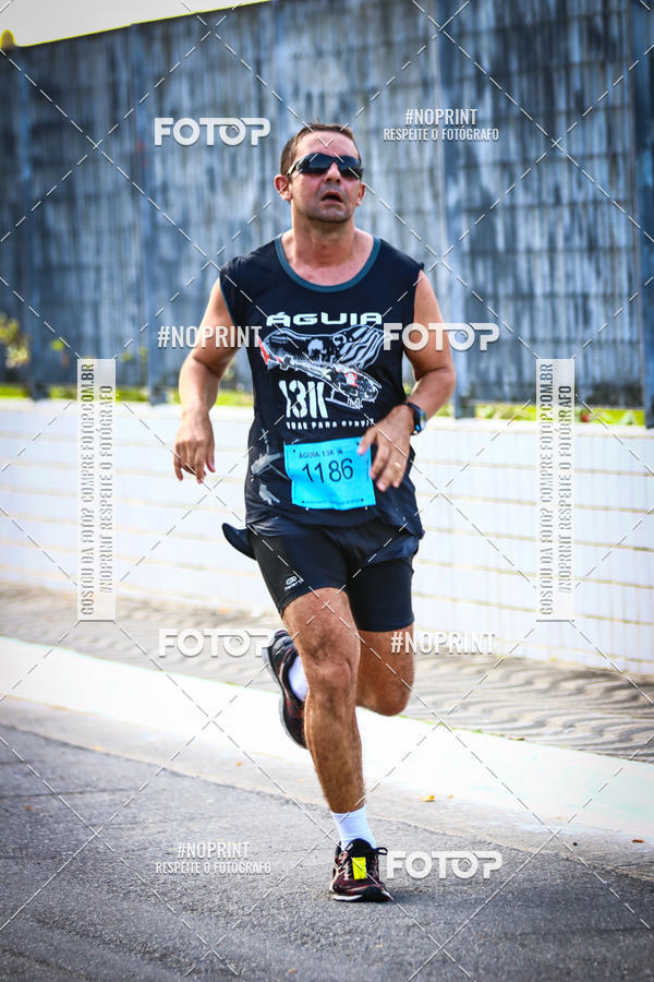 Buy your photos of the eventguia 13K Praia Grande on Fotop