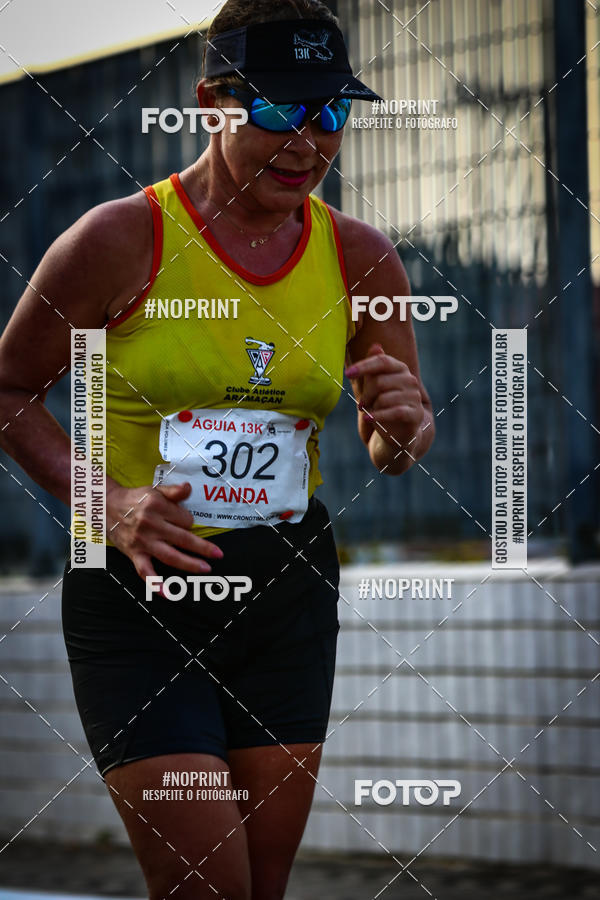 Buy your photos of the eventguia 13K Praia Grande on Fotop