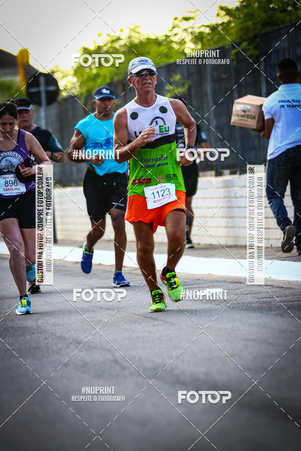 Buy your photos of the eventguia 13K Praia Grande on Fotop