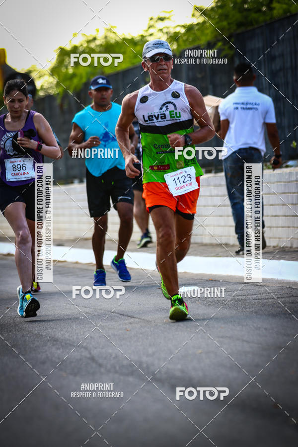 Buy your photos of the eventguia 13K Praia Grande on Fotop