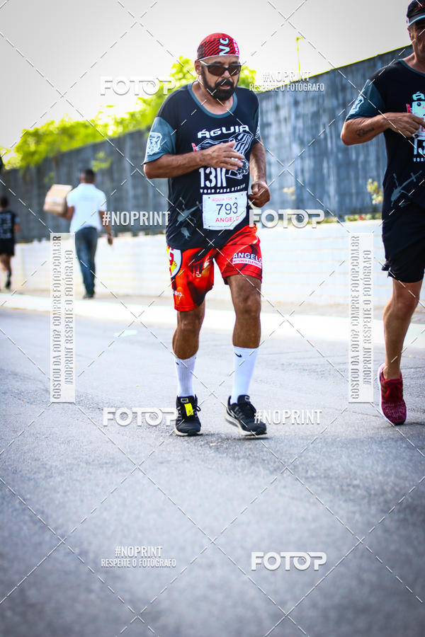 Buy your photos of the eventguia 13K Praia Grande on Fotop