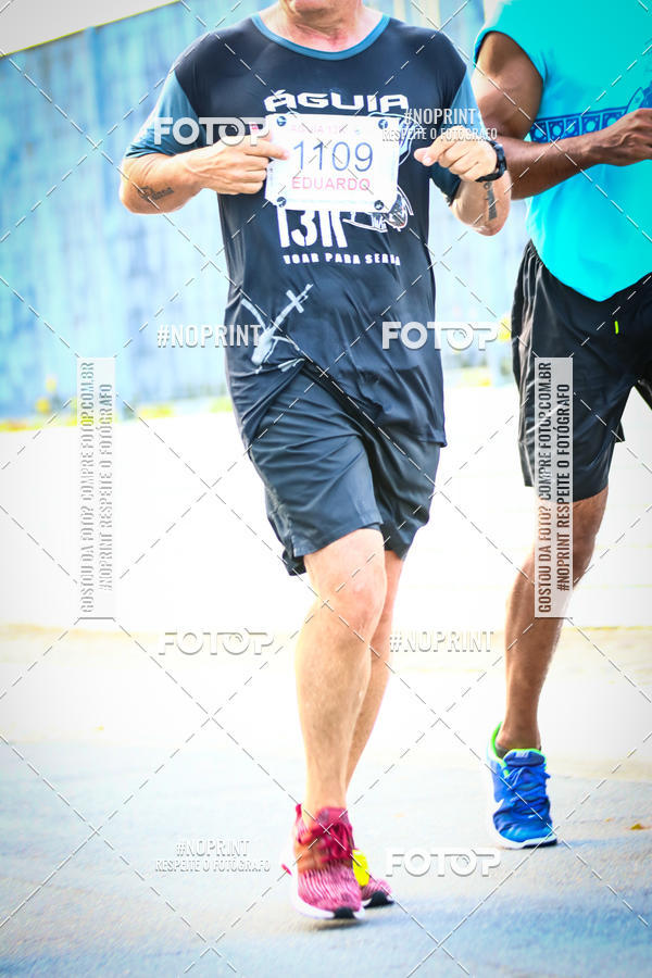 Buy your photos of the eventguia 13K Praia Grande on Fotop