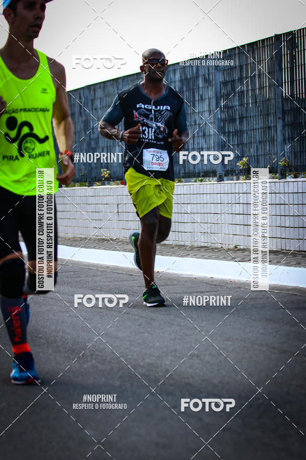 Buy your photos of the eventguia 13K Praia Grande on Fotop