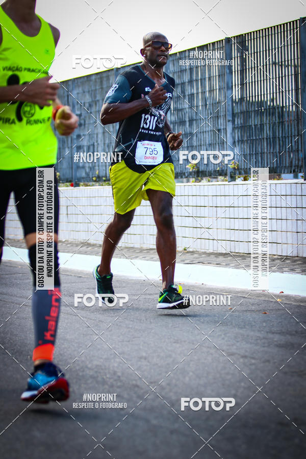 Buy your photos of the eventguia 13K Praia Grande on Fotop