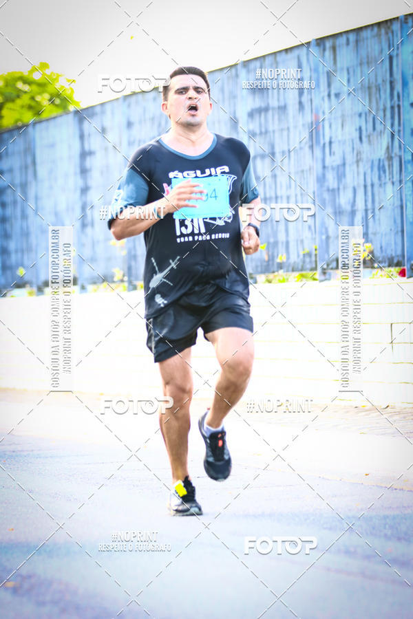 Buy your photos of the eventguia 13K Praia Grande on Fotop