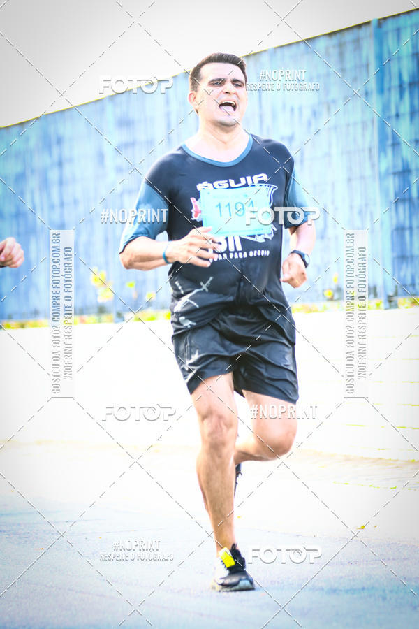 Buy your photos of the eventguia 13K Praia Grande on Fotop