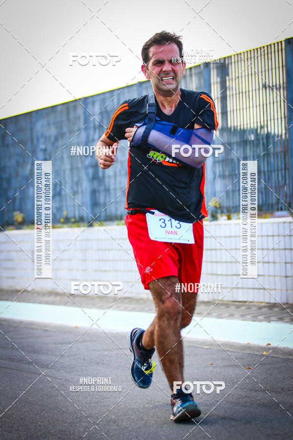 Buy your photos of the eventguia 13K Praia Grande on Fotop