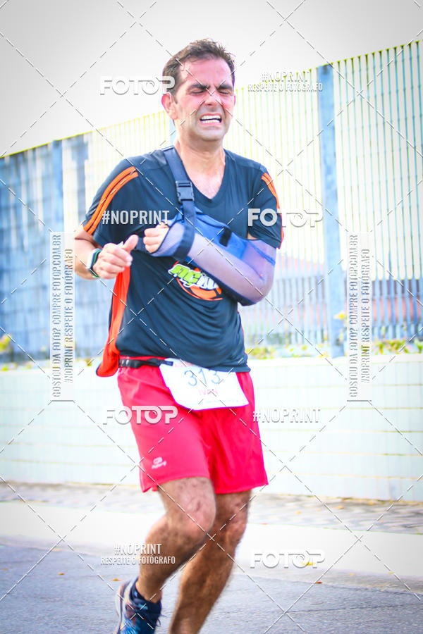 Buy your photos of the eventguia 13K Praia Grande on Fotop