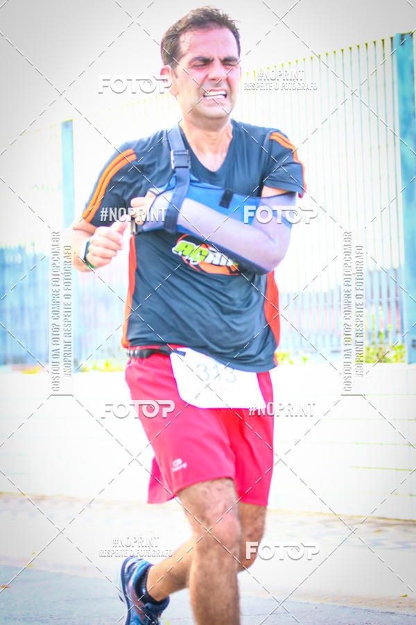 Buy your photos of the eventguia 13K Praia Grande on Fotop