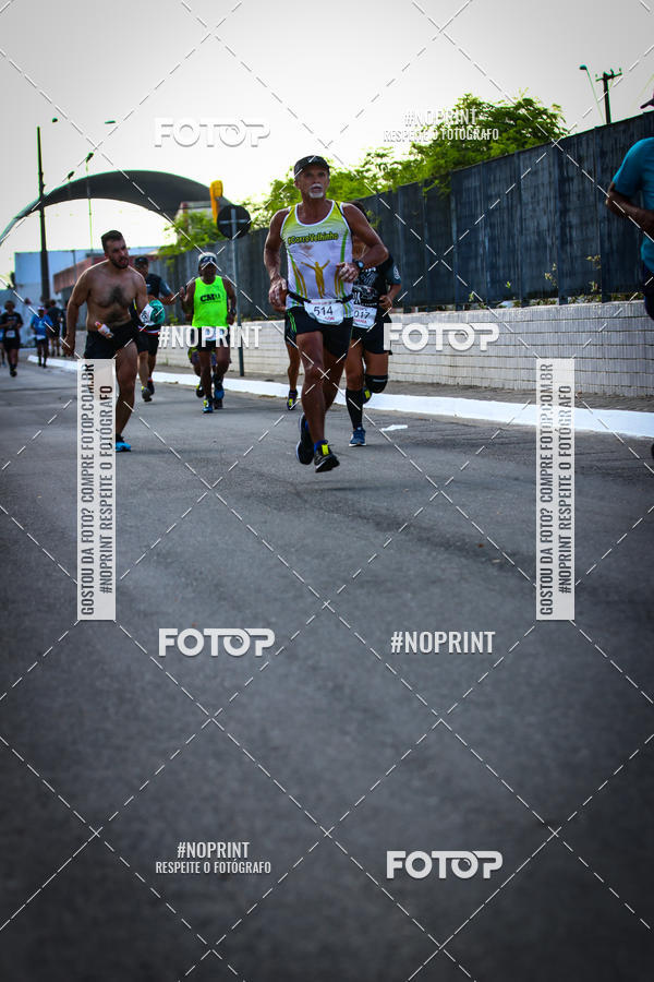 Buy your photos of the eventguia 13K Praia Grande on Fotop