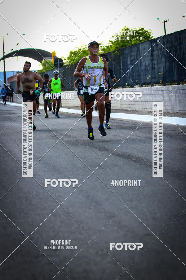 Buy your photos of the eventguia 13K Praia Grande on Fotop