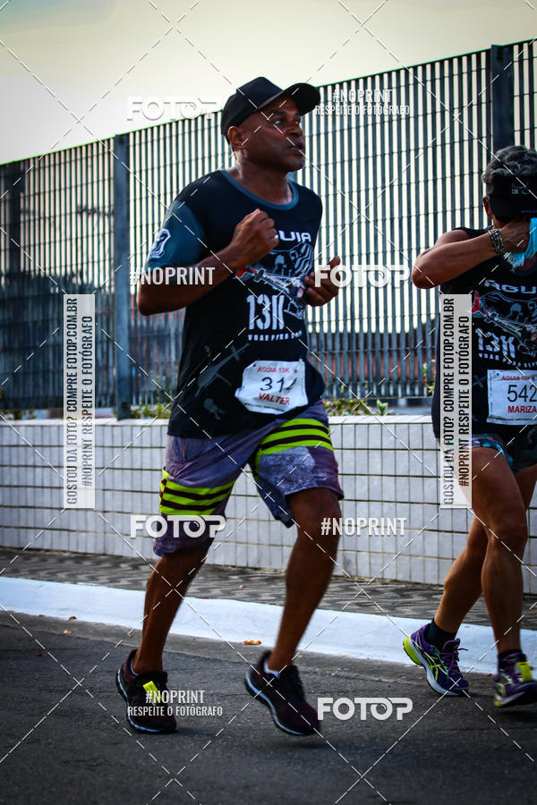 Buy your photos of the eventguia 13K Praia Grande on Fotop