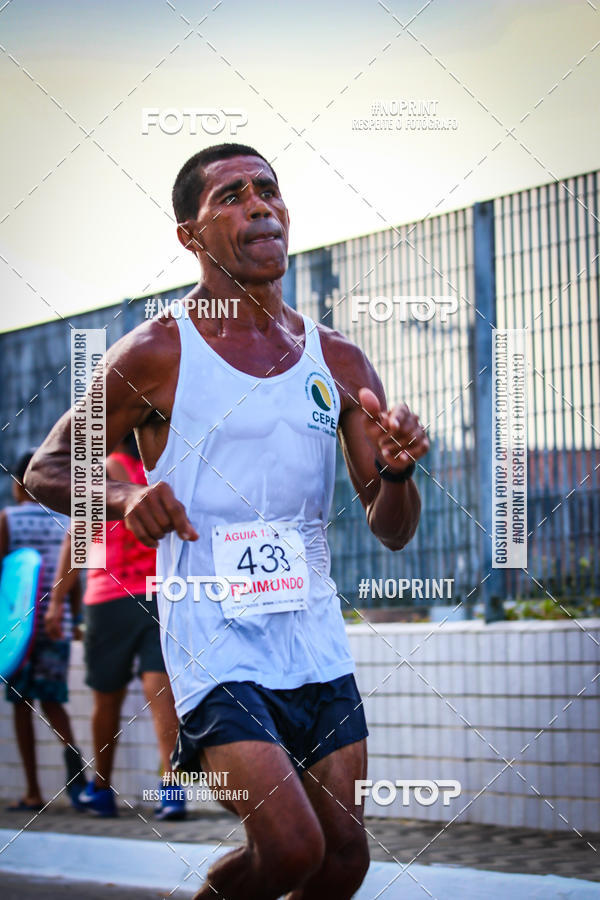 Buy your photos of the eventguia 13K Praia Grande on Fotop